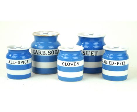 Five T G Green Cornish ware storage jarsTo include 'Suet', BI. Carb. Soda', 'Cloves', 'Candied-Peel', 'All-Spice', height of 