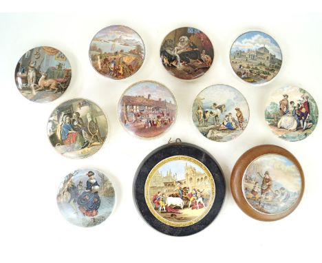 Eleven F. R. Pratt Prattware pot lidsTo include 'Contrast', 'Philadelphia Exhibition 1876', 'Skaters', 'The Bull Fight' 