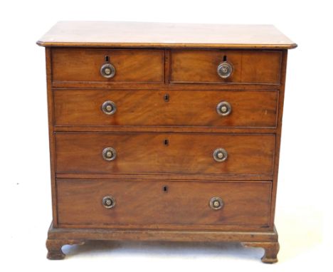An 18th Century straight front chest of drawersThe rectangular top with front canted corners above two short and three long g