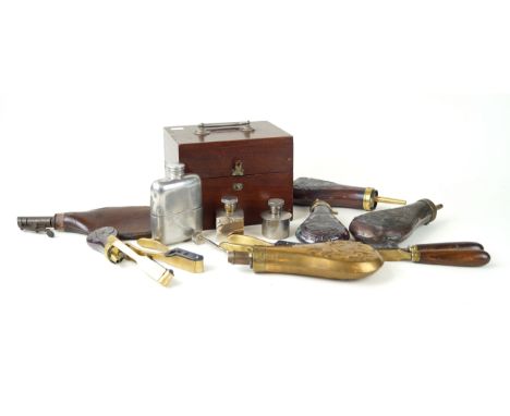 A collection of five copper and brass powder flasks, 20th CenturyA leather shot flask, bullet moulds, oil jars, shot flask an