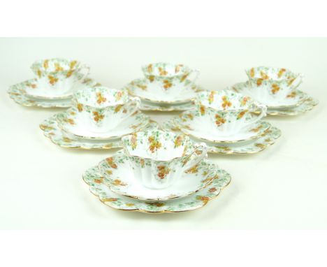 A Foley bone china tea serviceDecorated in the Trailing Daisies pattern in the empire shape, comprising eight cups, twelve sa