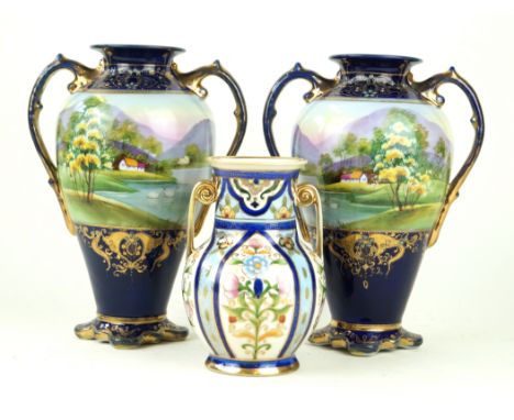 A pair of Noritake hand-painted porcelain twin handled vasesEach decorated with landscape views inside gilt scrolls, factory 