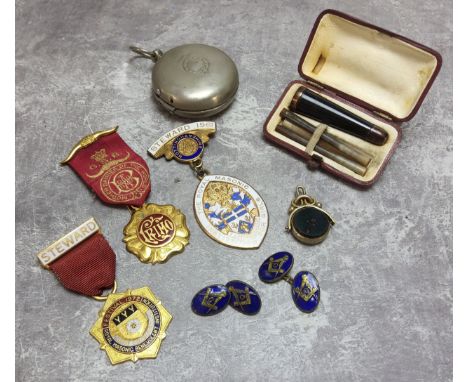 A 9ct gold mounted tortoiseshell cheroot holder in original Moroccan leather fitted case; a pair of enamel Masonic cufflinks;