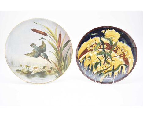 A group of art pottery chargers and plates, early 20th century, comprising an Old Moravian (Austria) pottery Art Nouveau char