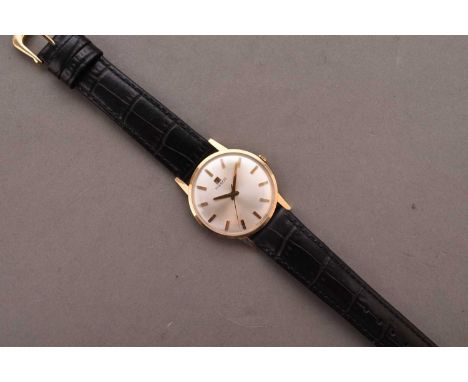 Tissot: A gentleman's 18ct gold wristwatchDate: Circa 1970Movement: Jewelled manual windDial: Sunburst silver, applied gilt b