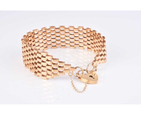 A 9ct gold six bar gate link bracelet, with heart shaped padlock clasp, hallmarked London 1977, weight approx 17.3