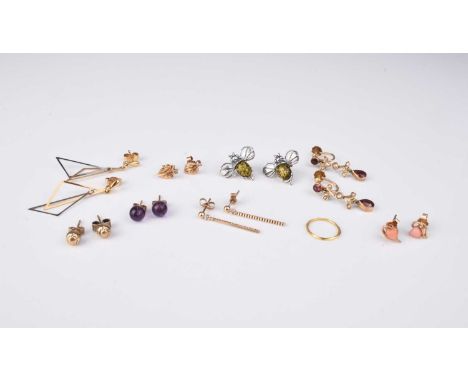 A collection of earrings, comprising; a pair of garnet and seed pearl drops, stamped '9ct', a pair of 9ct gold baton drop ear