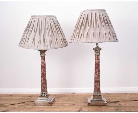 A pair of electroplate and variegated pink marble Corinthian column table lamps On stepped square bases. 56cm high (2)  Condi