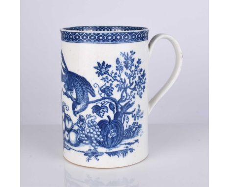 A large Caughley 'Parrot Pecking Fruit' porcelain mug, circa 1780-85, transfer-printed in underglaze blue with the main print