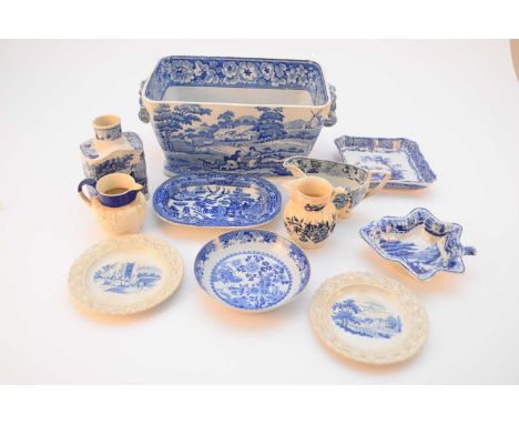 A collection of English blue and white pottery, early 19th century, including a Davenport 'Muleteer' circular dish raised on 