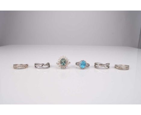 A blue and white stone set oval cluster ring, stamped '14k', weight approx 4.4g, together with five silver stone set rings (6