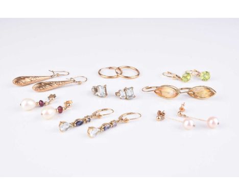 A collection of 9ct gold and yellow metal earrings, to include; a pair of 9ct gold marquise citrine examples, a pair of 9ct g