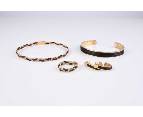 A woven elephant hair and yellow metal bangle with matching ring, together with an elephant hair and yellow metal torque styl