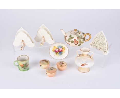 A collection of Royal Worcester and Grainger &amp; Co Worcester miniatures including blush ivory, comprising three openwork l