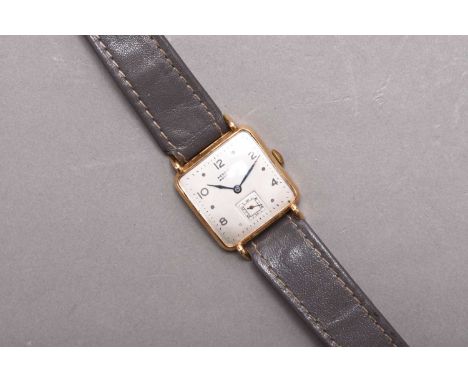 West End Watch Co: A gentleman's 18ct gold wristwatchReference: 7155.12Date: Circa 1955Movement: Jewelled manual windDial: Si