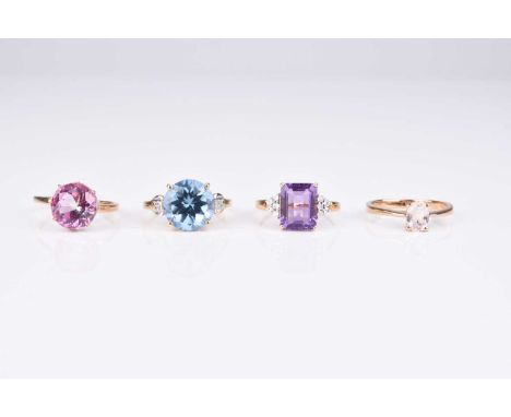 A 9ct gold blue topaz ring, size N 1/2, together with a 9ct gold amethyst ring, size L 1/2, a 9ct gold shank with loose pink 