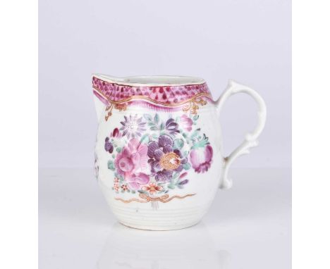 A Worcester porcelain sparrow beak milk jug, circa 1765-70, of barrel form with scroll handle, the body applied with scrollin
