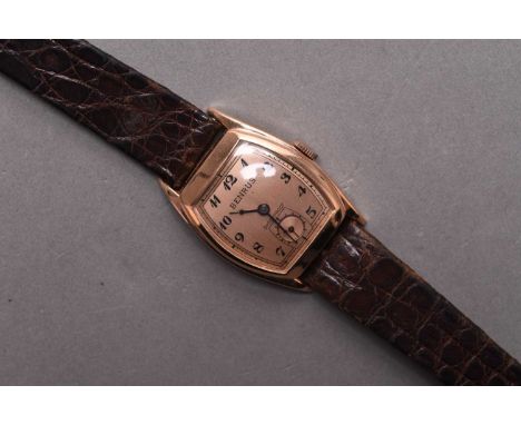 Benrus: A 14ct gold wristwatchDate: Circa 1940Movement: 17 jewel Cal.AR1 manual windDial: Brushed rose gold, black Arabic num