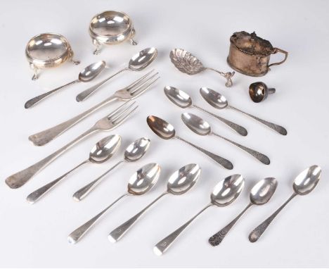 A small collection of silver, comprising; two mid-18th century three prong forks, marks rubbed, a set of six silver teaspoons