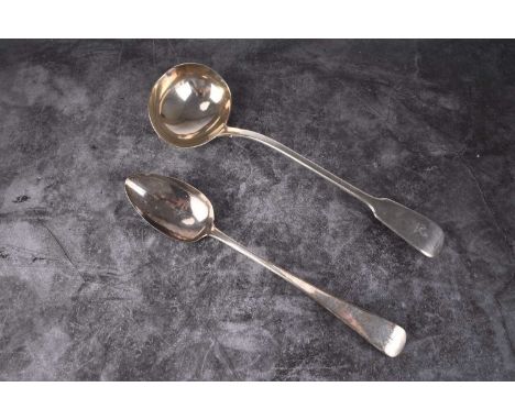 A Fiddle pattern silver soup ladle, Mary Chawner, London 1838, with engraved crest, 33cm long, together with a silver basting