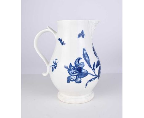 A rare Caughley porcelain 'Thorny Rose' mask-head jug, circa 1775-79, transfer-printed in underglaze blue, of baluster form o