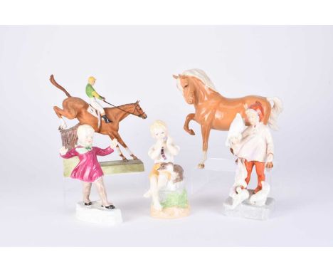 Royal Worcester models comprising 'Over the Sticks' modelled by Doris Lindner, model number 3166 (tail re-attached); three Fr