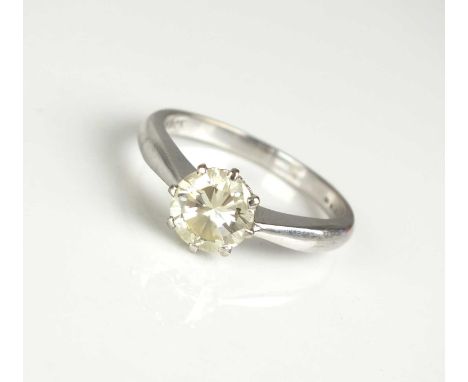 A single stone diamond ring, the brilliant cut diamond claw set in white metal to white metal shank, stamped '18ct', ring siz
