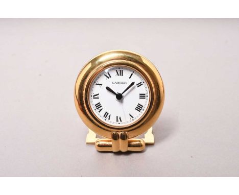 Cartier: A gilt brass desk alarm clockDate: Circa 2000Movement: QuartzDial: White, black Roman numerals, 'railroad' outer min