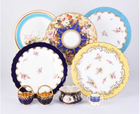 A mixed group of ceramics comprising a pair of Victorian dessert plates, centrally painted with floral arrangements within tu