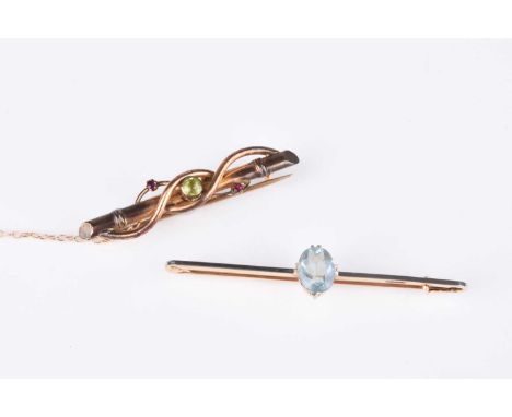 A single stone aquamarine bar brooch, stamped '9c18w', together with an early 20th century peridot and ruby bar brooch, total