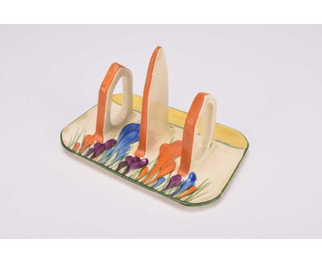 A Clarice Cliff for Newport Pottery Bizarre toast rack in the Crocus pattern, circa 1928-30s of rectangular form with three d