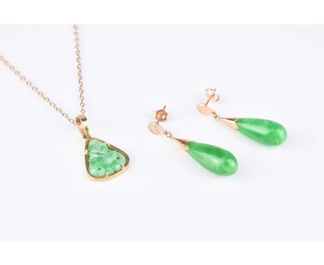 A pair of jade ear pendants, of polished drop form with yellow metal mounts and post fittings, not stamped, together with a j