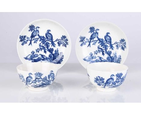 Two Caughley porcelain 'Birds in Branches' tea bowls and saucers, one circa 1778-80, the other 1785-90, transfer-printed in u