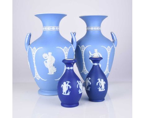A pair of Wedgwood light blue jasperware dip vases, late 19th/early 20th century, modelled in relief with typical Classical m