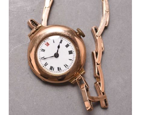 A lady's 9ct gold wristwatchDate: Circa 1926Movement: 17 jewel Cal.1026 manual windDial: White enamel, black Roman numerals, 