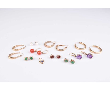 A collection of earrings, to include; a pair of 9ct gold amethyst examples, a pair of 9ct gold polished bead examples, a pair