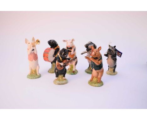 A part set of Beswick pig band figures, comprising John Conductor PP1; Matthew Trumpeter PP2; David Flutist PP3 (flute detach