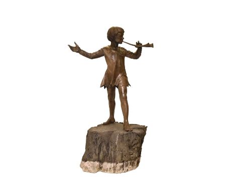 After Everard Meynell (b.1950), Peter PanBronzed cast resin, modelled standing and playing the pipes, set on a rustic 'tree s