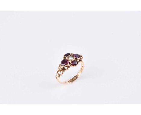 A Victorian 12ct gold garnet and split pearl ring, hallmarked Birmingham, weight approx 1.9gCondition:Ring size N, some wear 