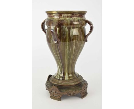 A Linthorpe oil lamp base attributed to Christopher Dresser, late 19th century, shape 652, with four lug handles, decorated i