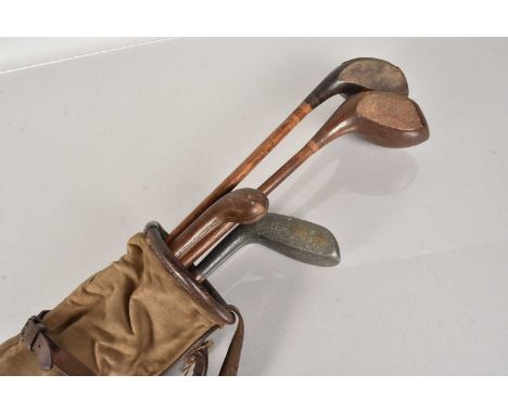 Golf, a Braid-Mills 1915 Model, Flat 10oz Club, together with two other clubs, plus two walking sticks