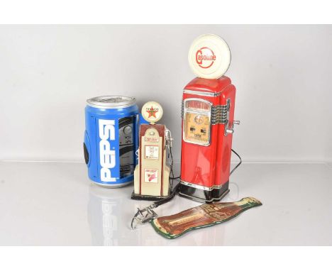 A Pepsi Cassette Radio, in the form of a can, together with another radio in the from of a petrol pump, plus a enamel Coca Co