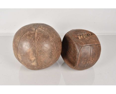 Football, an early 20th Century leather football, together with a vintage medicine ball (3kg)