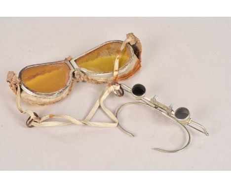 A pair of Carl Zeiss Jena Binocular Loupe/magnifying glasses, face worn, mared 2x DDR, in case, together with a pair of war p