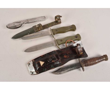 Two HSK70 fighting knives, one with scabbard, the other without, another fighting knife, plus a campaign set (parcel) no post