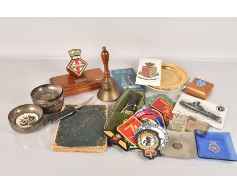 A collection of various items, to include French silver plated bowls with plaques, cloth patches, a Writing book with various