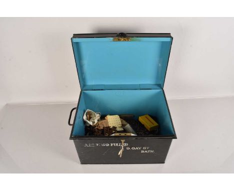 A large collection of vintage keys, various sizes and ages, all within a vintage metal case, with lock