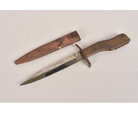 A German Demag Trench knife, 15.5cm long double edge blade, marked 'Gestzlich Geschutzt', complete with scabbard, no postage 