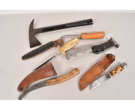 An Air Ministry Survival Knife by J Wilson, together with a Dinghy Knife, a Folding Machete, an Axe, Scout's Knife by Witness