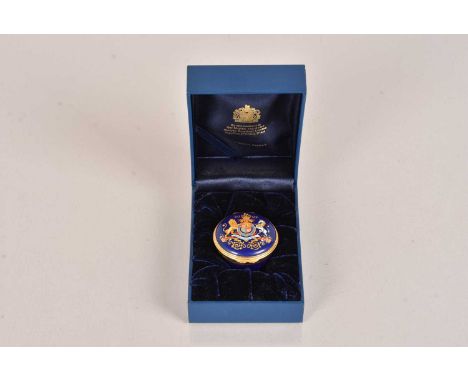 H.M. Queen Elizabeth II, 2002 Royal Household Christmas Present, Halcyon Days circular enamel box, having Royal Arms and 2002